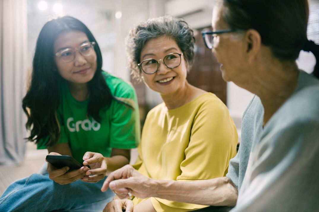 group of elderly friends chatting