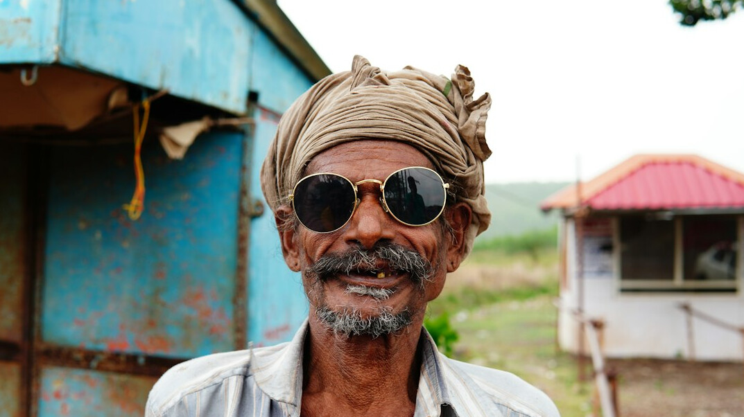Portrait of a smiling senior man with glasses