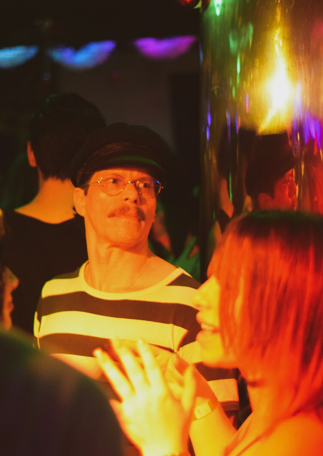 senior friends chatting in club