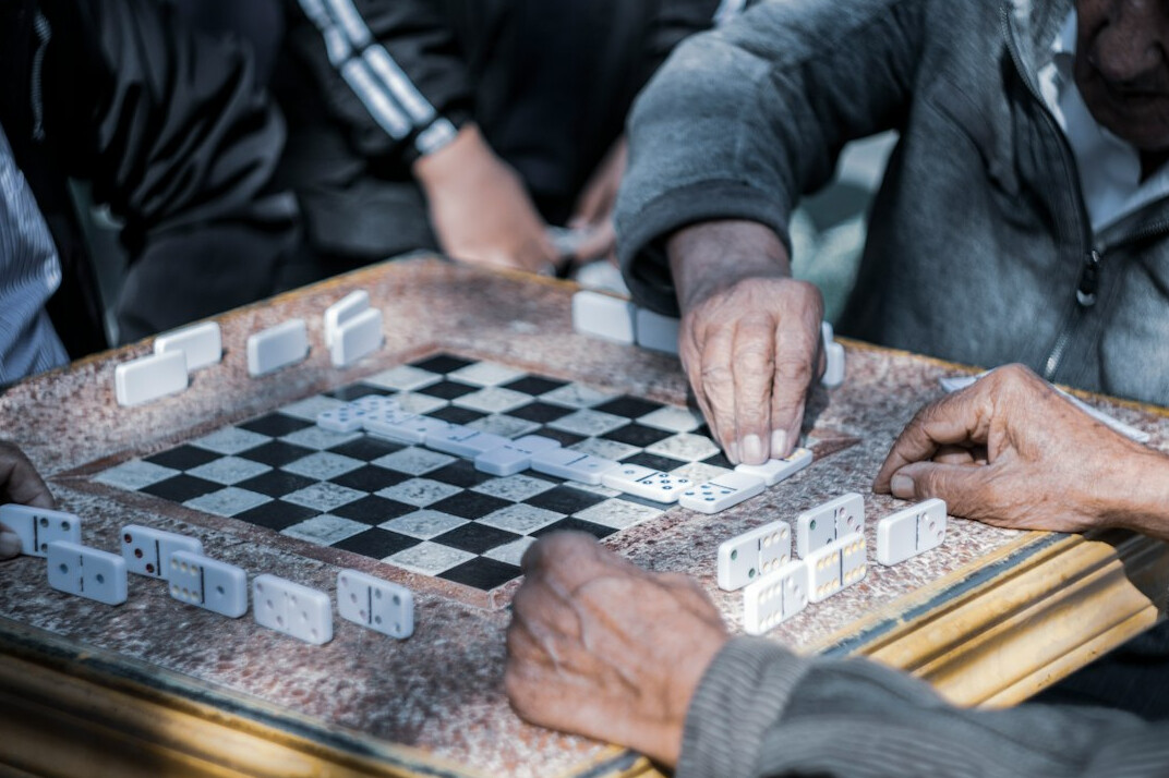 senior group playing board games
